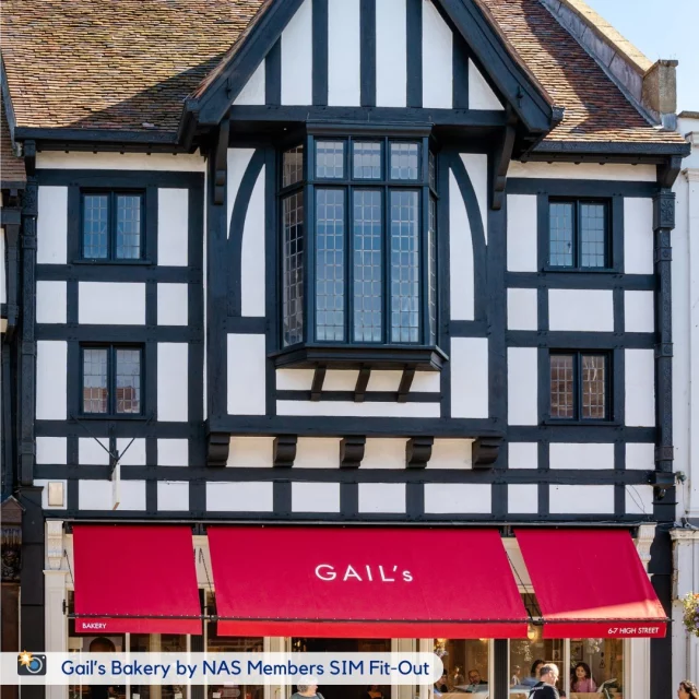 NAS Members @sim_fit_out have delivered a fresh perspective to Stratford-upon-Avon with their recent fit-out project at @gailsbakery, blending Tudor Revival charm with modern design.

The work involved transforming the site from a shell to a stunning space, complete with a new MF ceiling, updated shopfront, and terracotta-toned herringbone tiles behind the service counter.

Sustainability took centre stage as the team retained and refurbished the original timber-panelled staircase and reclaimed flooring, breathing new life into these historic features.

Recycled and refurbished furniture from other GAIL’s sites was used, ensuring a project that truly respects both heritage and the environment.

An impressive achievement by the SIM Fit-Out team 👏